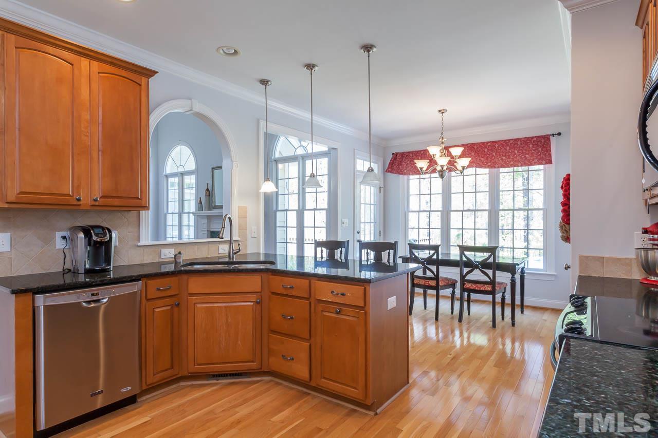 5216 Levering Mill Road Apex, NC 27539 - Photo 9 of 23 a kitchen with lots of counter top space