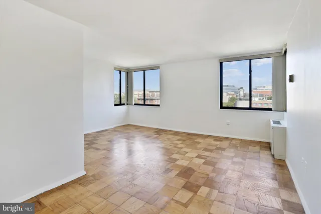 a view of an empty room with a window