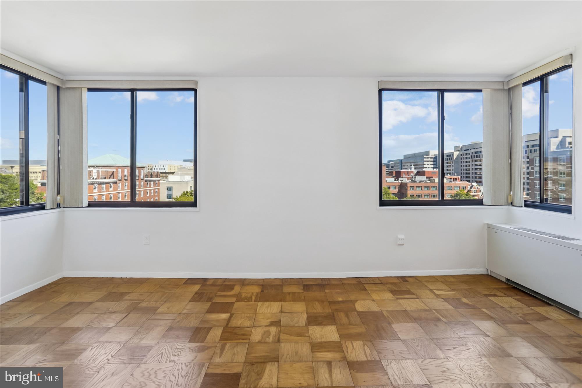 2030 F Street Northwest, Unit 906 Washington, DC 20006 - Photo 13 of 33 a view of an empty room with a window