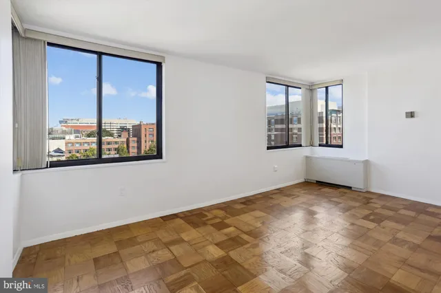 an empty room with windows