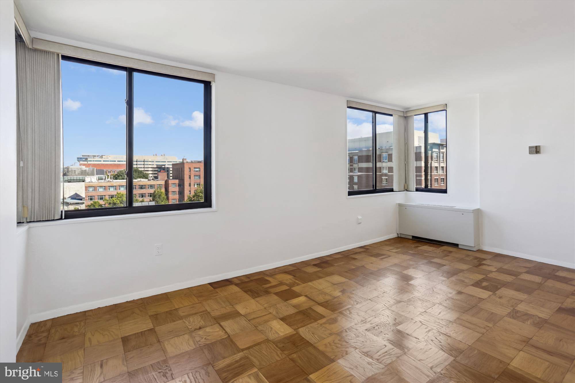 2030 F Street Northwest, Unit 906 Washington, DC 20006 - Photo 15 of 33 a view of an empty room with a window