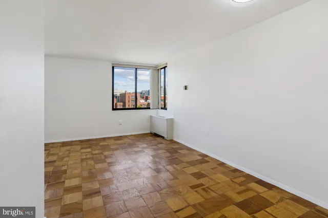 a view of an empty room and window