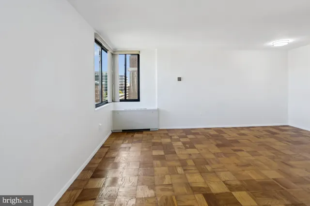 a view of an empty room and window