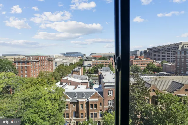 a white stove top oven sitting inside of a kitchen