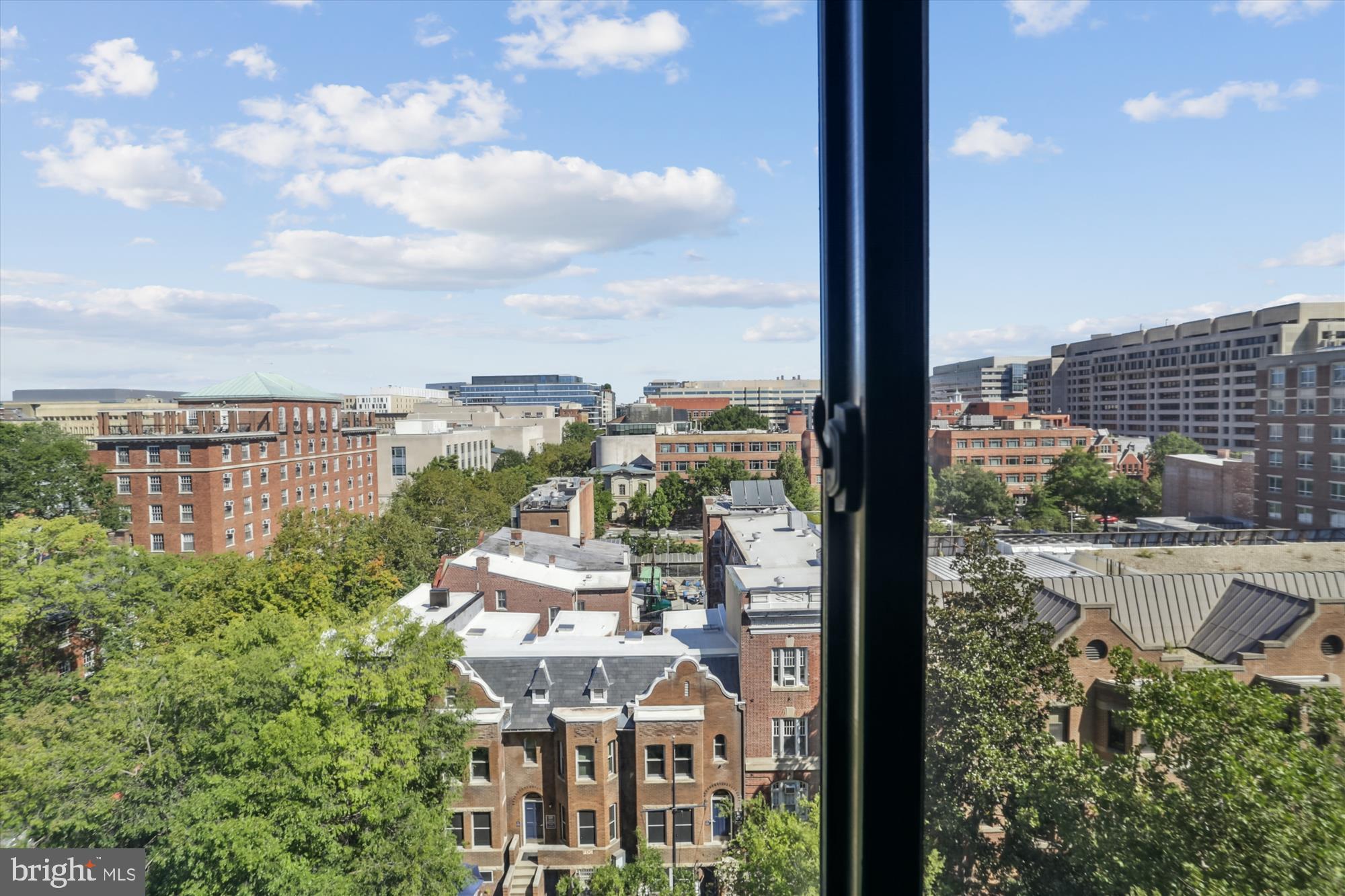 2030 F Street Northwest, Unit 906 Washington, DC 20006 - Photo 21 of 33 a view of a city with tall buildings and ocean view