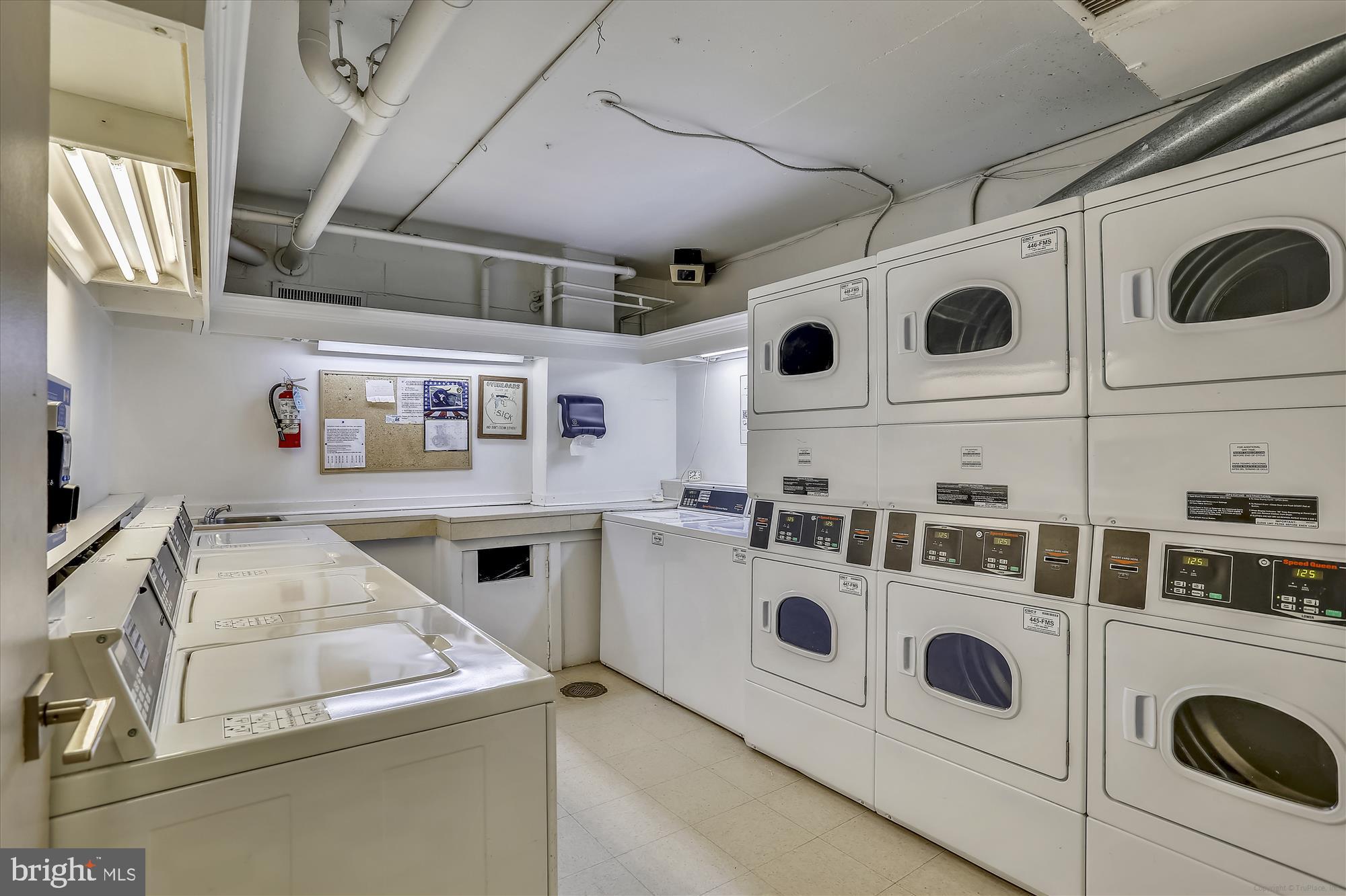 2030 F Street Northwest, Unit 906 Washington, DC 20006 - Photo 31 of 33 a view of washer and dryer with washer and dryer