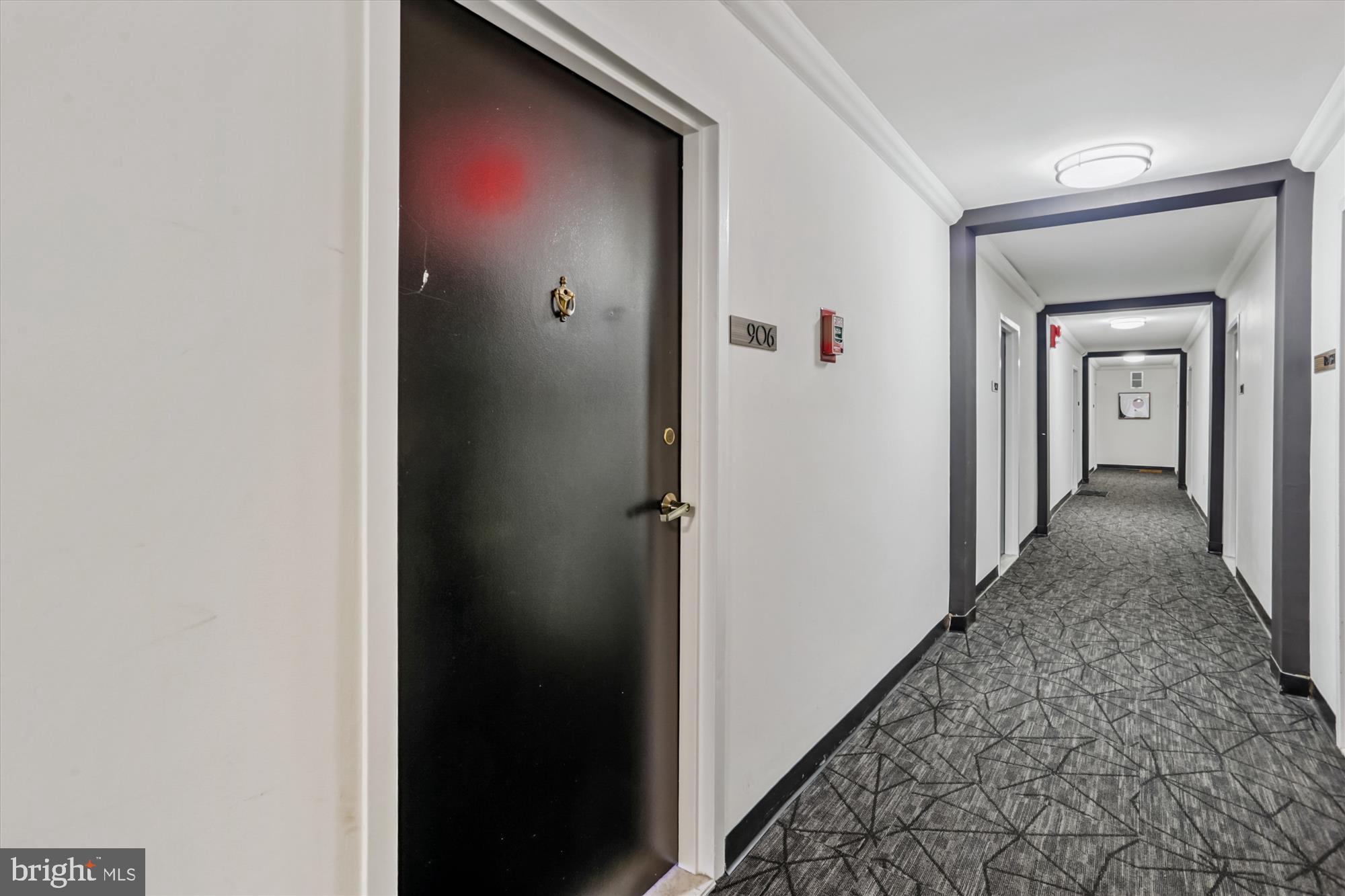 2030 F Street Northwest, Unit 906 Washington, DC 20006 - Photo 8 of 33 a view of a hallway with wooden floor