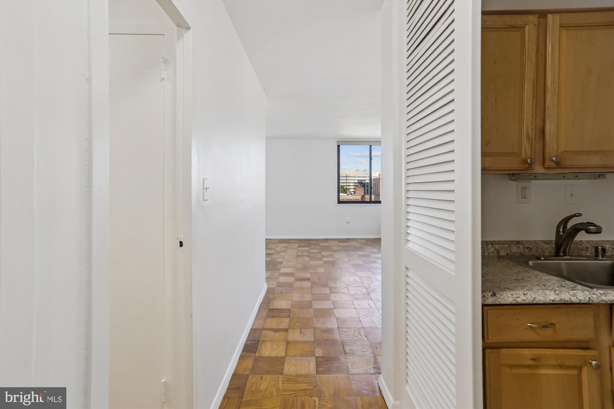 2030 F Street Northwest, Unit 906 Washington, DC 20006 - Photo 10 of 33 a bathroom with a sink and a mirror