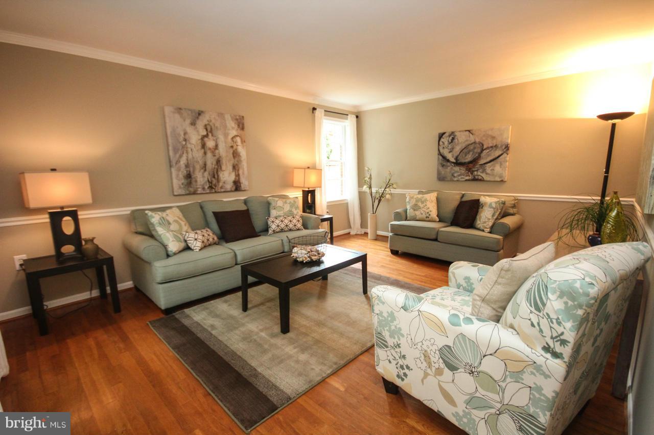 1429 Winding Waye Lane Silver Spring, MD 20902 - Photo 2 of 30 a living room with furniture and wooden floor