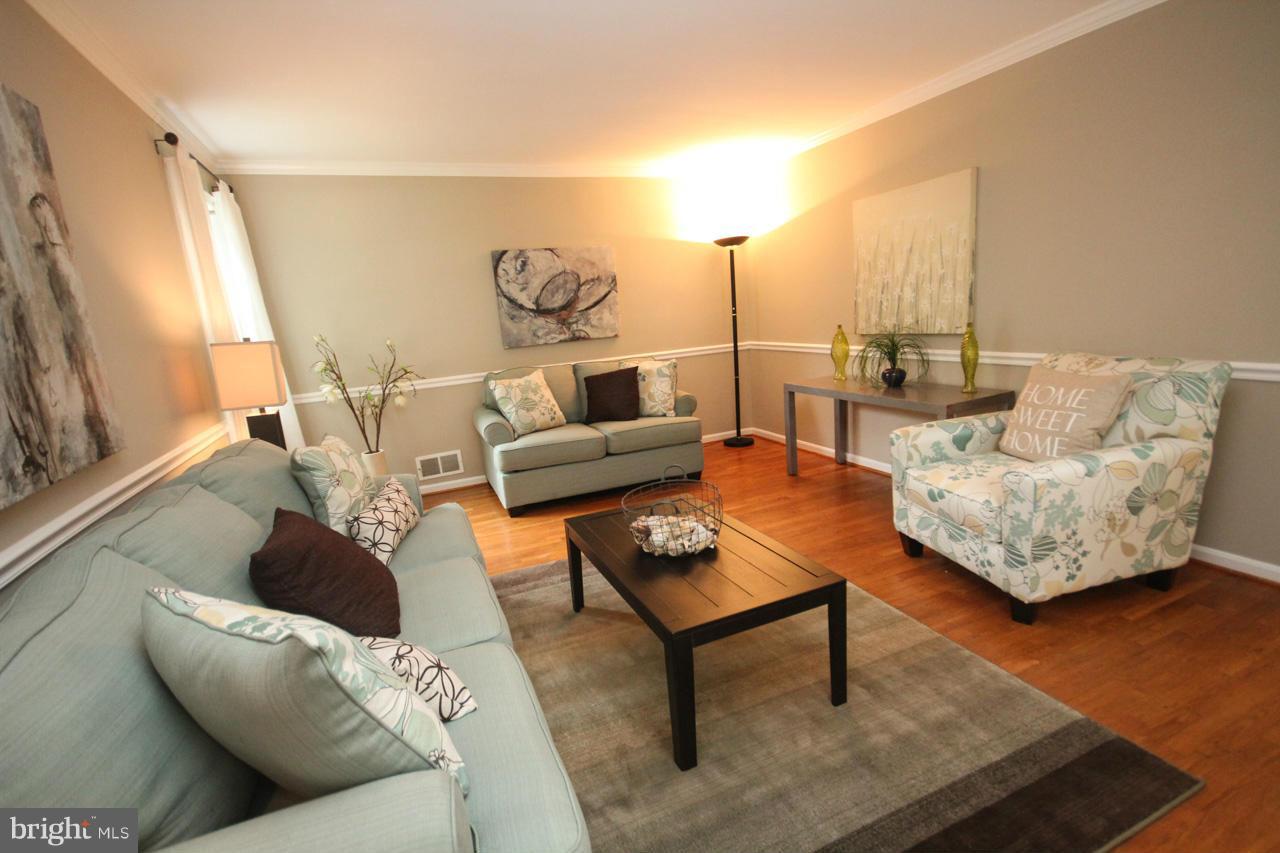 1429 Winding Waye Lane Silver Spring, MD 20902 - Photo 3 of 30 a living room with furniture and wooden floor
