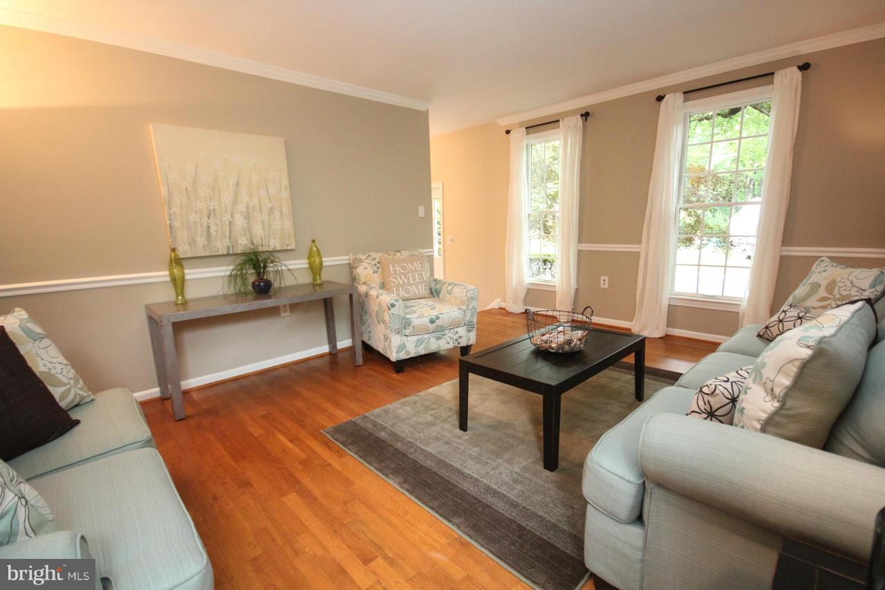 1429 Winding Waye Lane Silver Spring, MD 20902 - Photo 4 of 30 a living room with furniture and a window