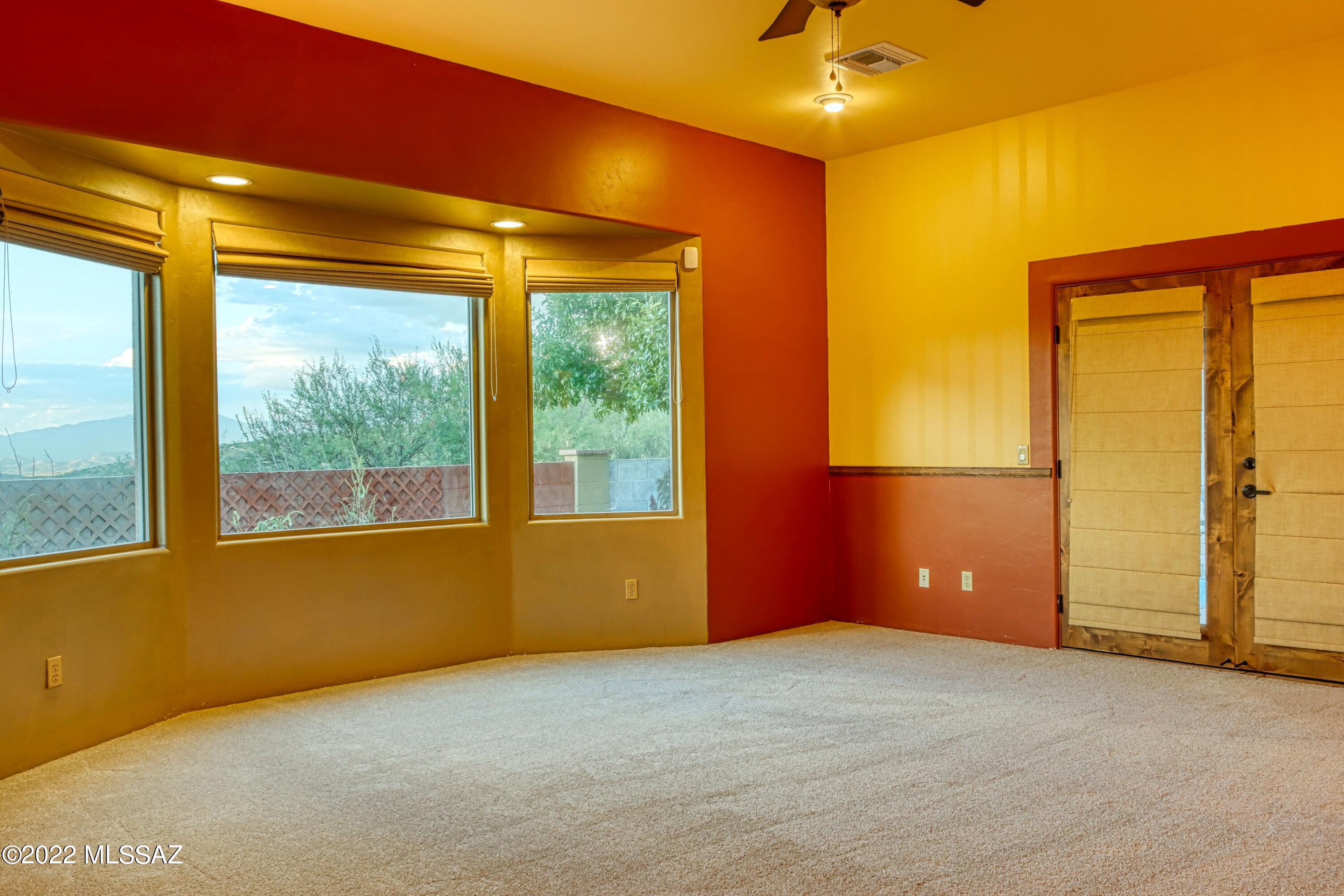 15393 East Hillton Ranch Road Vail, AZ 85641 - Photo 9 of 28 a view of an empty room with a window