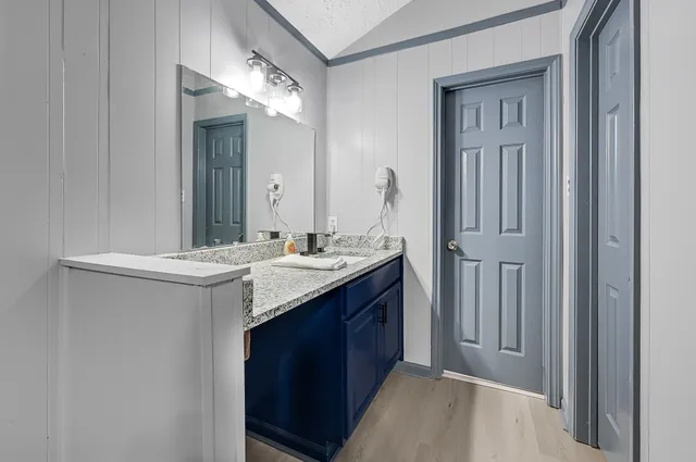 a white toilet sitting next to a shower curtain