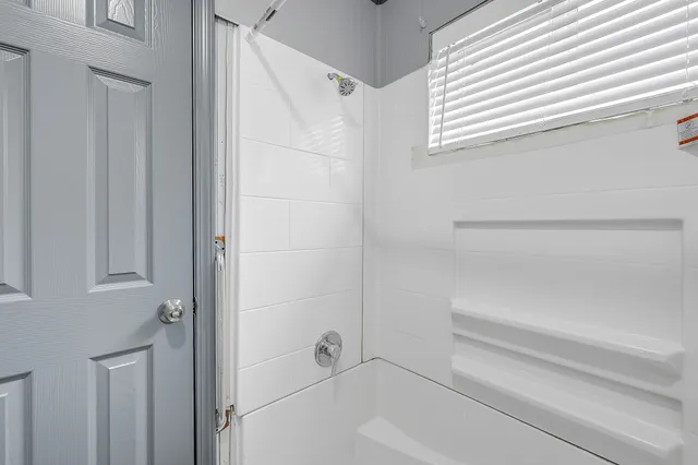 a view of an chairs and table in the patio