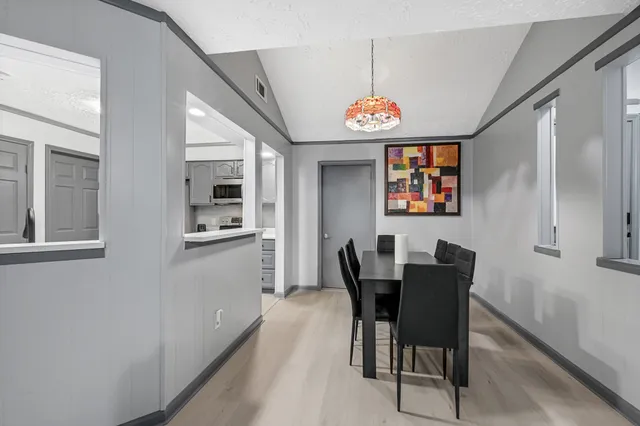 a view of a dining room with furniture