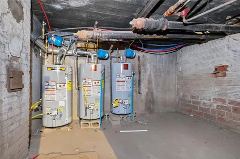 a utility room with cabinets