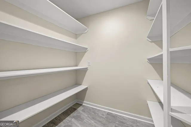 a view of an empty walk in closet