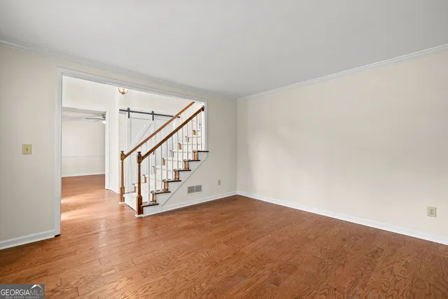 a view of entryway with wooden floor