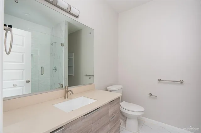 a bathroom with a sink and a toilet