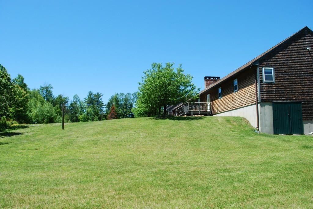 233 Bennett Pond Road Parkman, ME 04443 - Photo 7 of 35 There is a double door access to the...