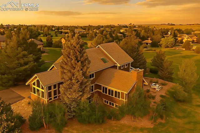 an aerial view of residential house with parking space