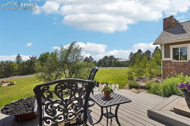 a living room with furniture windows and wooden floor