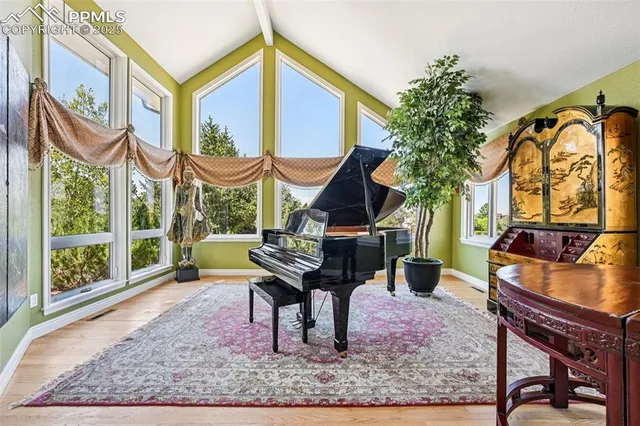 a kitchen with granite countertop a sink and cabinets