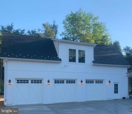 16907 Hughes Road Poolesville, MD 20837 - Photo 2 of 3 a view of a house with a outdoor space