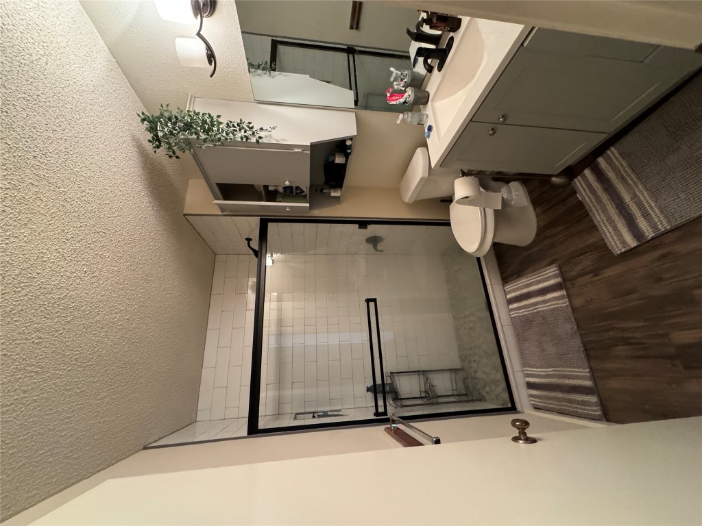 Undisclosed Address Austin, TX 78704 - Photo 8 of 10 a bathroom with a sink toilet and shower