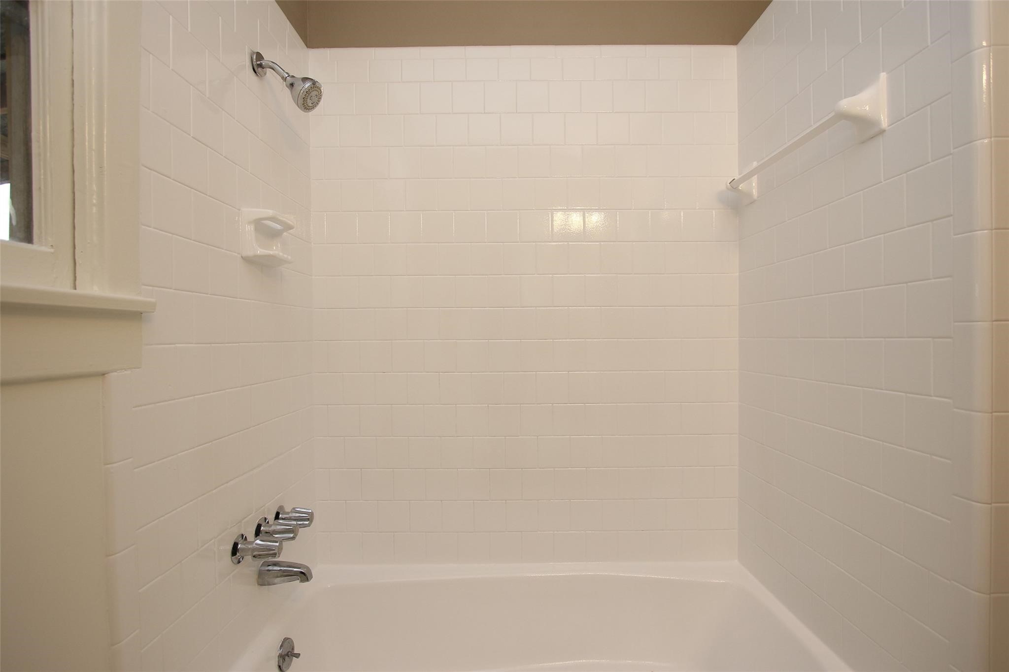 1127 Walling Street Houston, TX 77009 - Photo 17 of 23 a bathroom with a shower