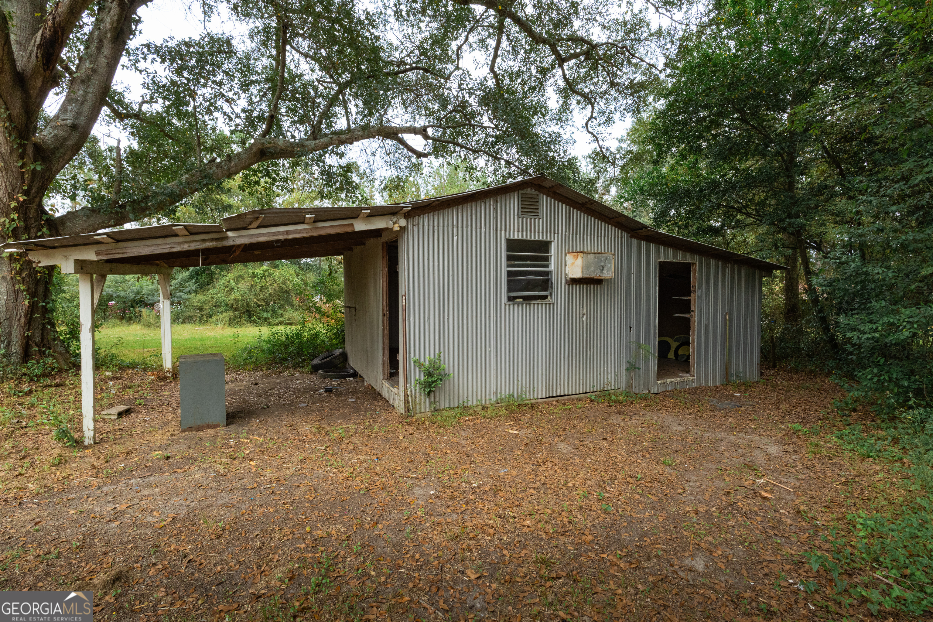 2165 Griffin Road Macon, GA 31216 - Photo 20 of 21 a view of backyard of house with green space