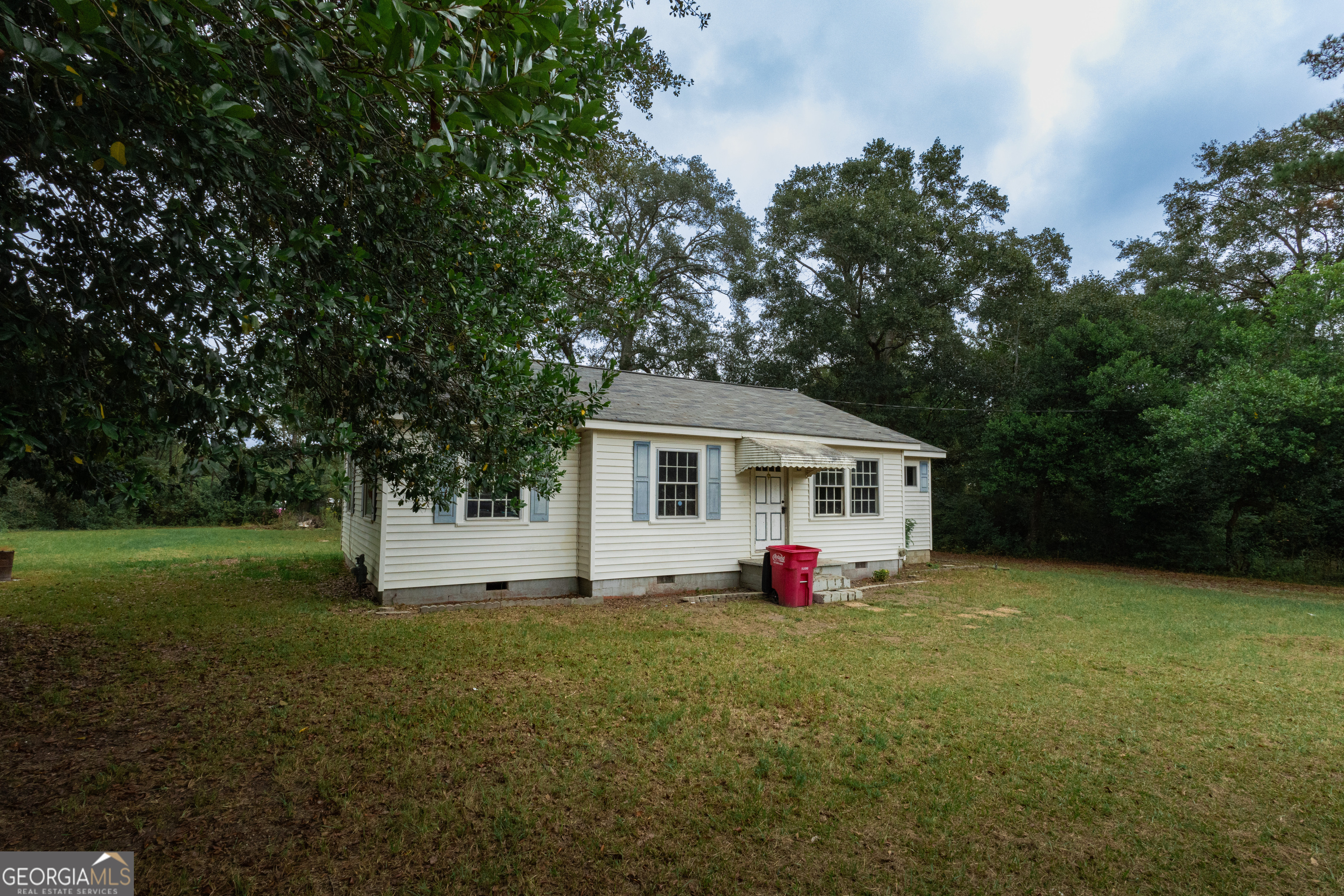 2165 Griffin Road Macon, GA 31216 - Photo 3 of 21 a view of a house with a yard