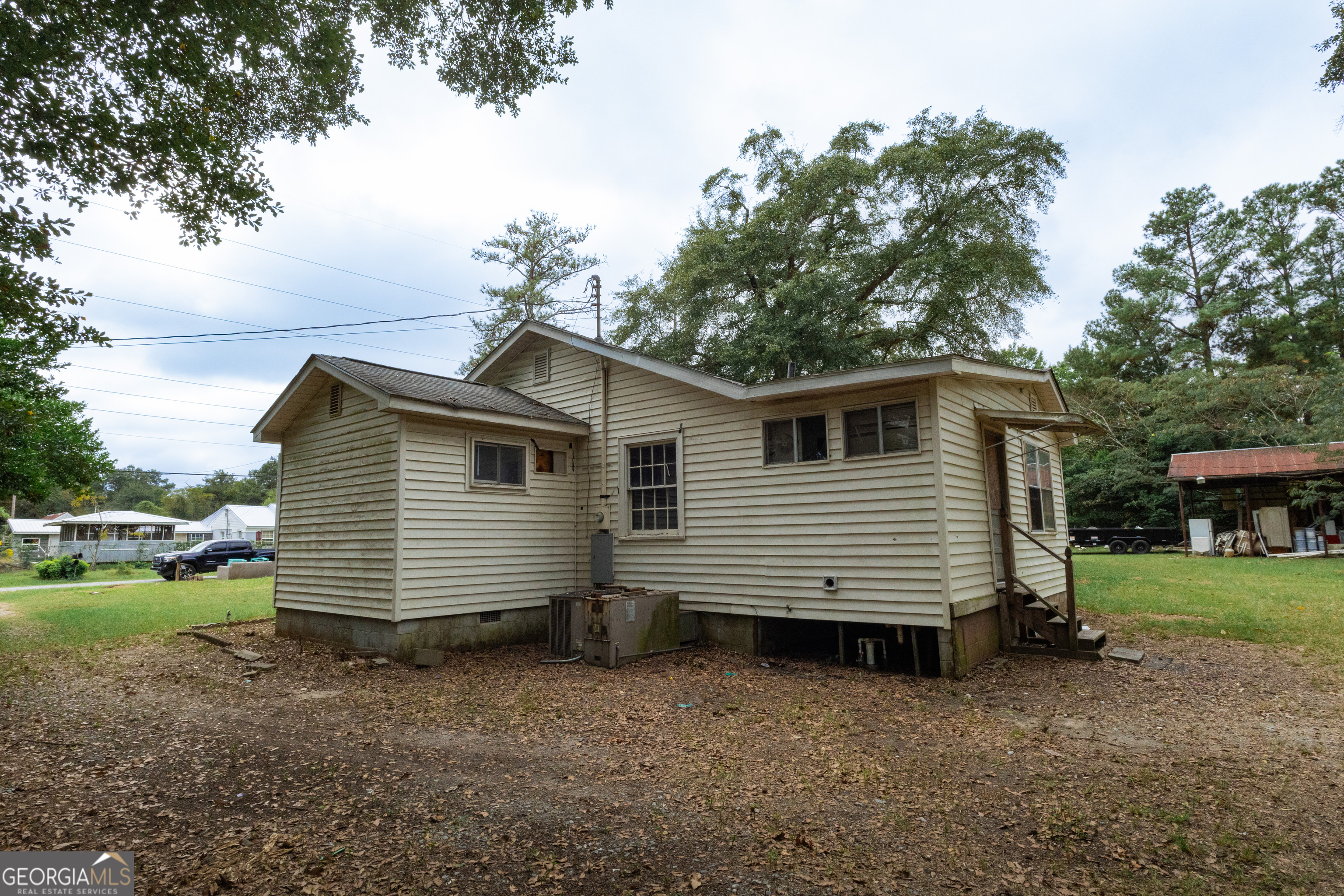 2165 Griffin Road Macon, GA 31216 - Photo 6 of 21 a view of a house with a yard