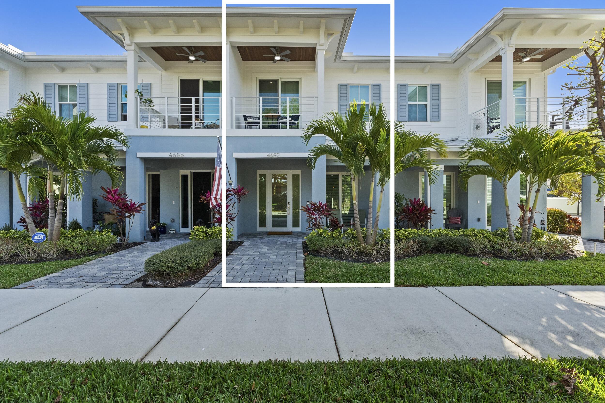 4692 Southeast Manatee Terrace Stuart, FL 34997 - Photo 2 of 47 front view of house with a yard