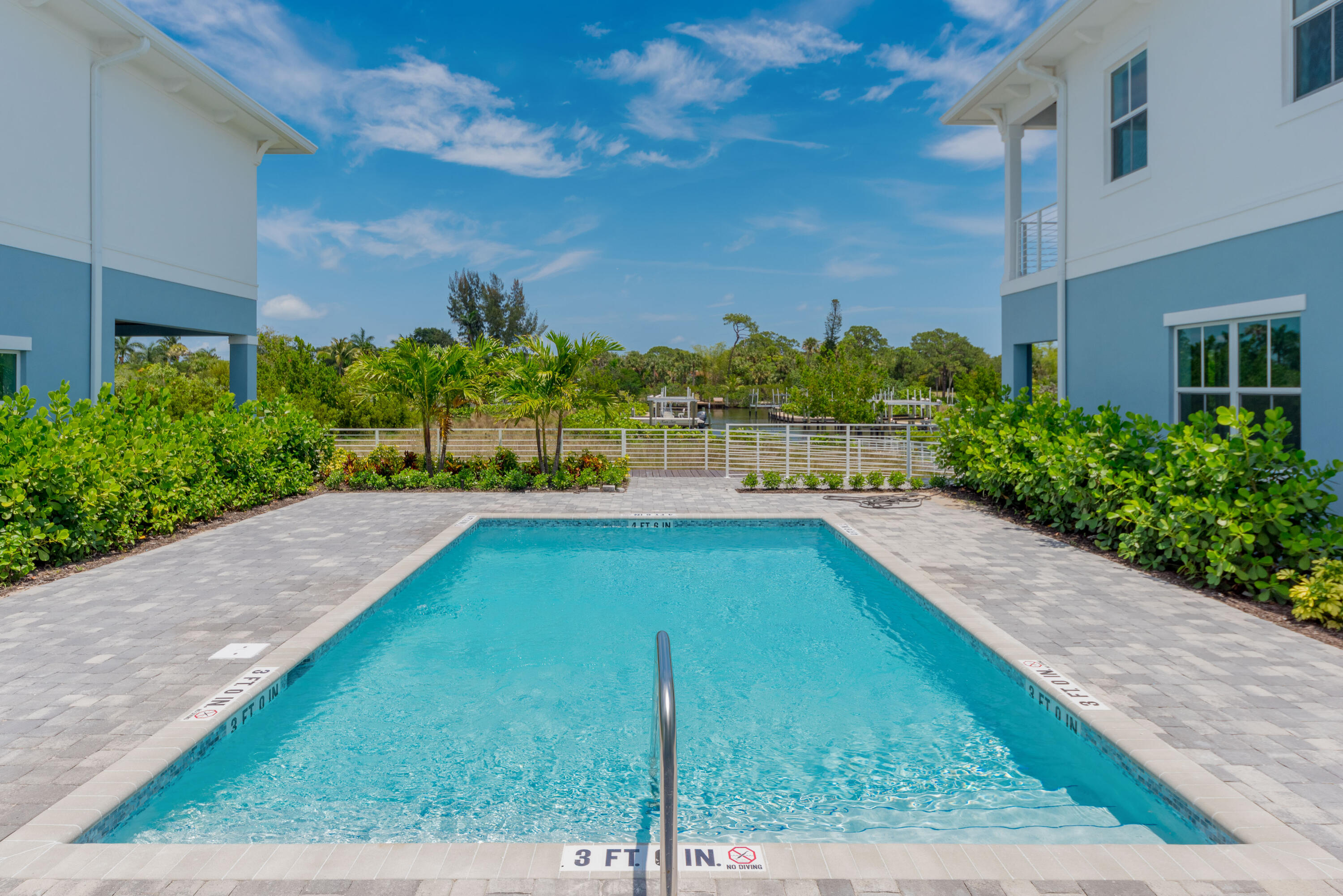 4692 Southeast Manatee Terrace Stuart, FL 34997 - Photo 28 of 47 a view of a backyard