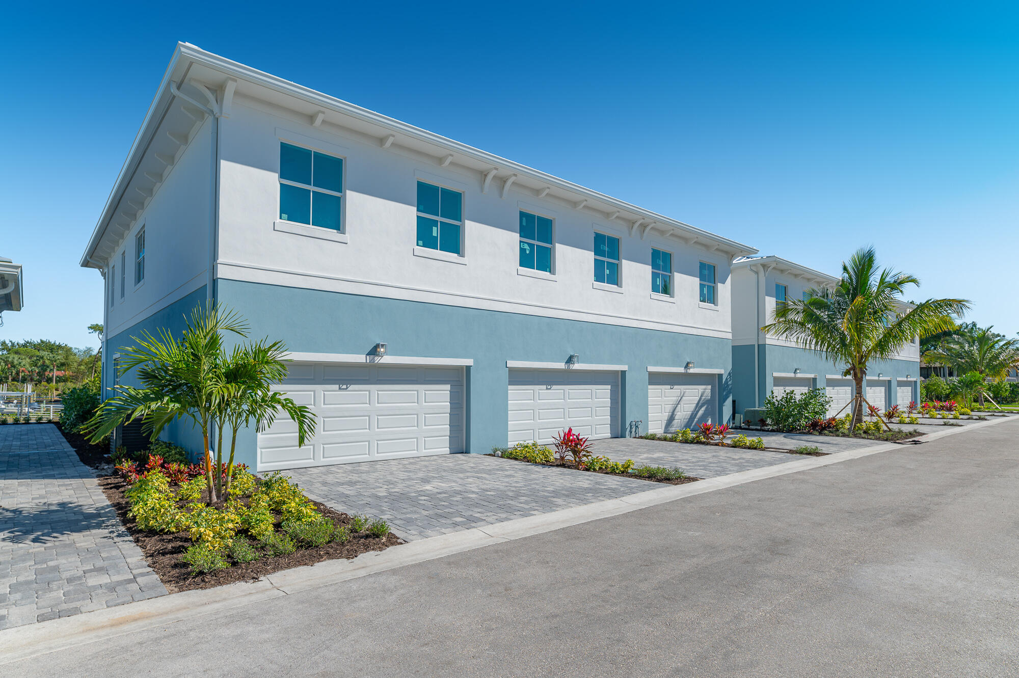 4692 Southeast Manatee Terrace Stuart, FL 34997 - Photo 30 of 47 a front view of house with yard and outdoor seating