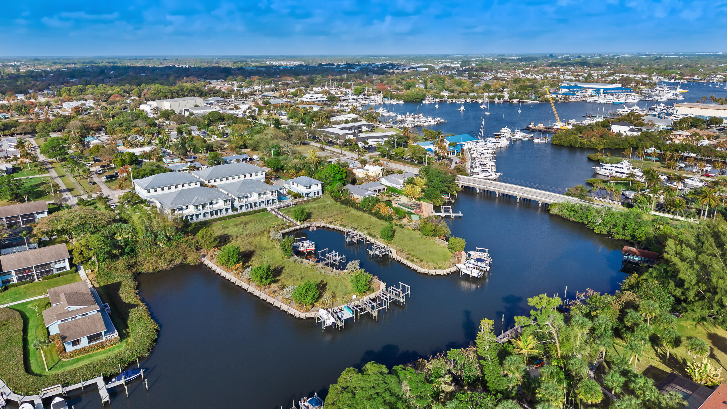 4692 Southeast Manatee Terrace Stuart, FL 34997 - Photo 38 of 47 an aerial view of residential houses with outdoor space