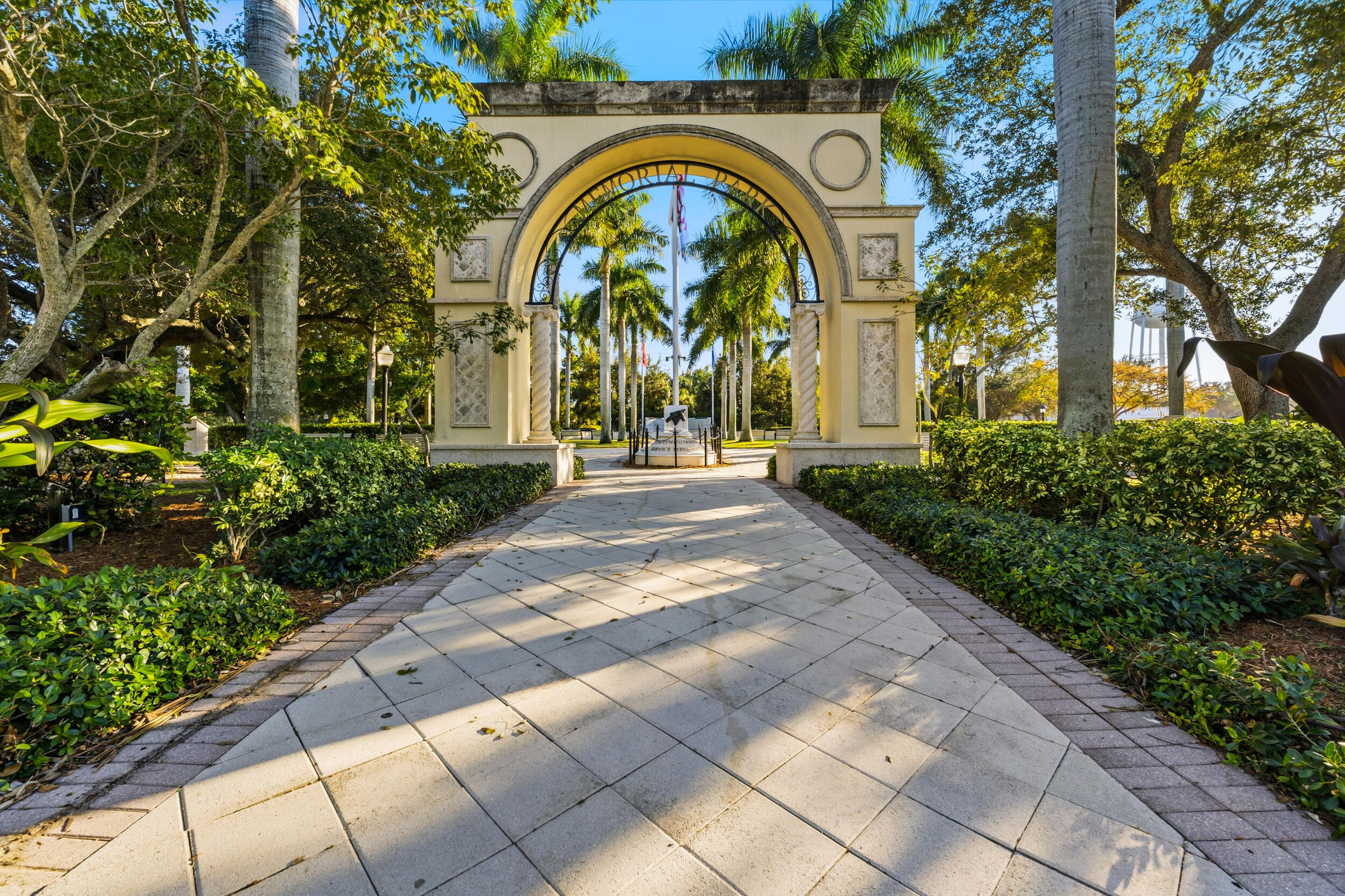 4692 Southeast Manatee Terrace Stuart, FL 34997 - Photo 43 of 47 a building with trees in front of it