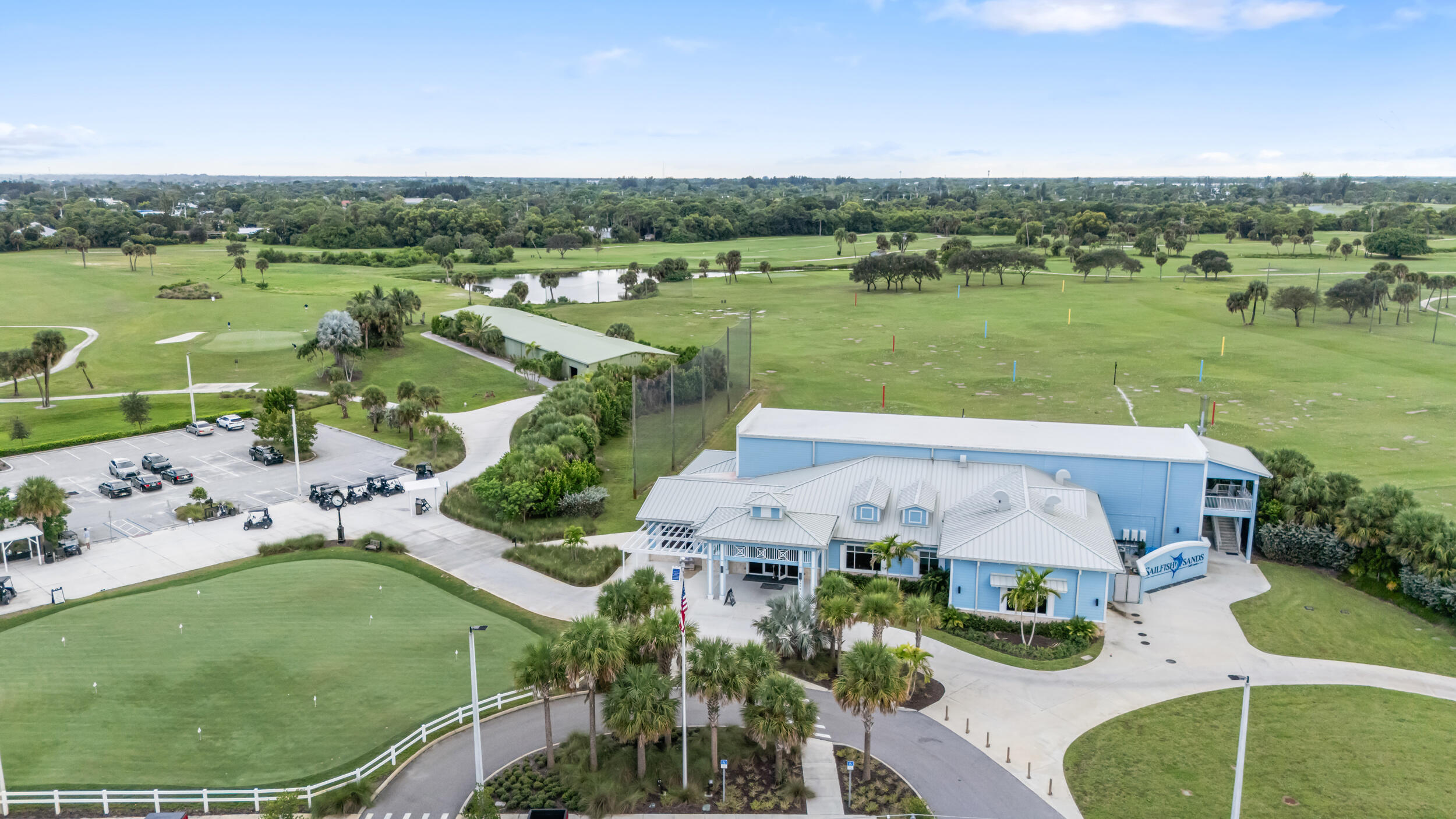 4692 Southeast Manatee Terrace Stuart, FL 34997 - Photo 46 of 47 an aerial view of a house with outdoor space