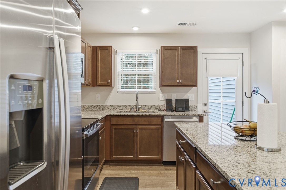 5512 Addison Gate Drive Richmond, VA 23234 - Photo 11 of 22 Kitchen with appliances with stainless steel finis