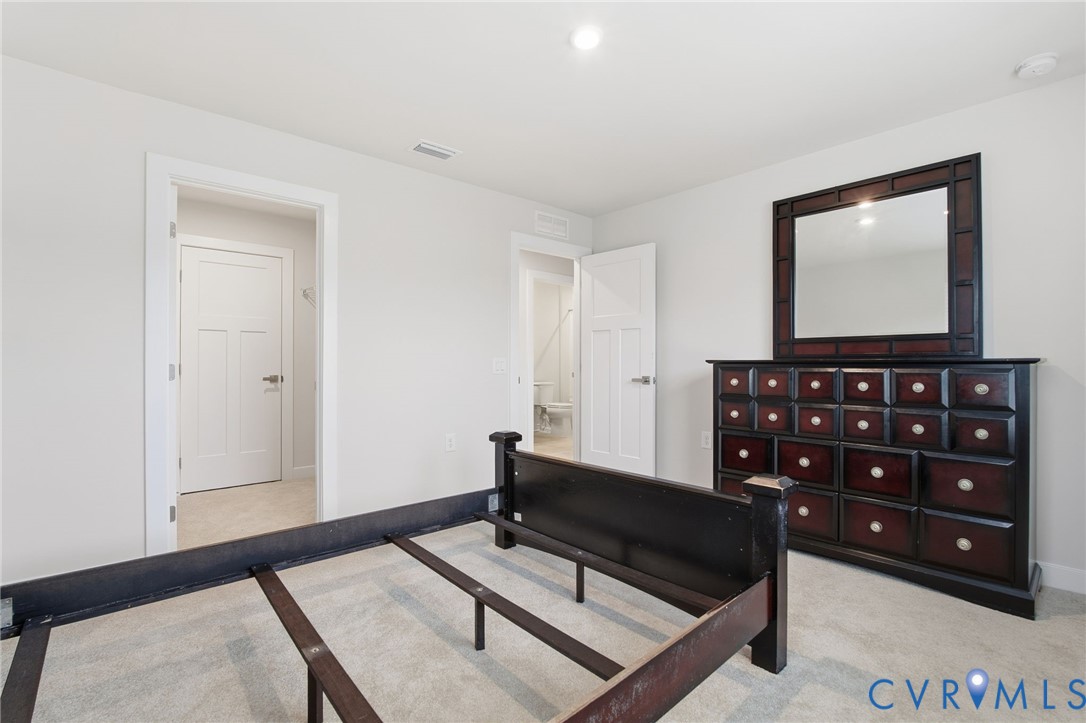 5512 Addison Gate Drive Richmond, VA 23234 - Photo 16 of 22 Bedroom with light carpet