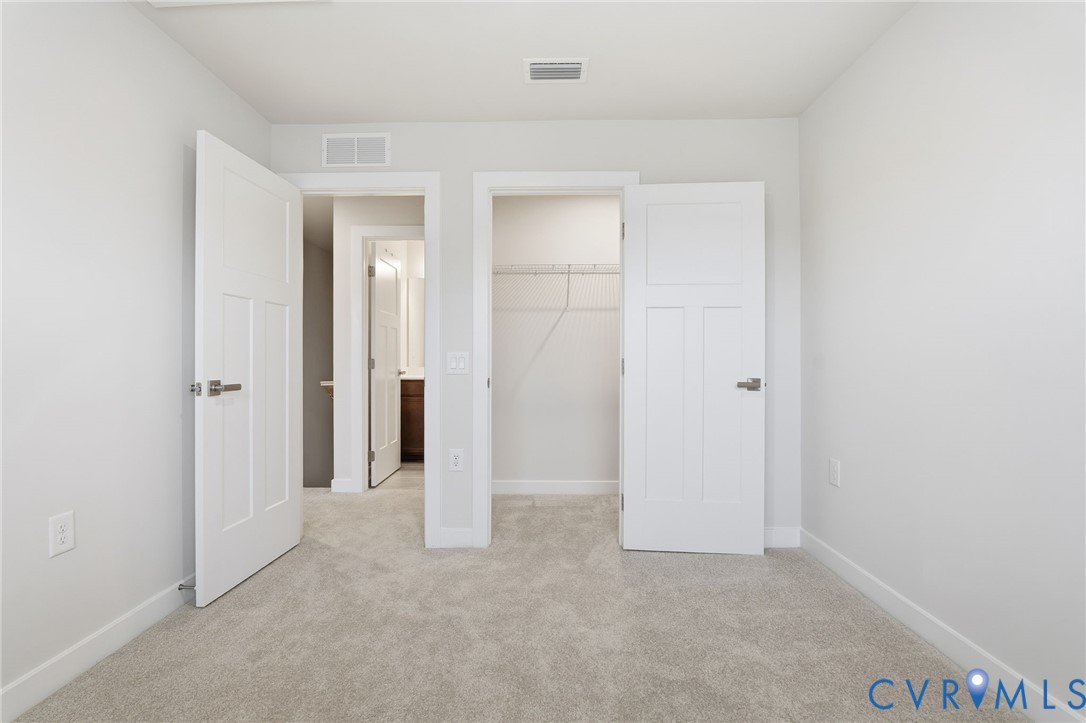 5512 Addison Gate Drive Richmond, VA 23234 - Photo 17 of 22 Unfurnished bedroom featuring light colored carpet