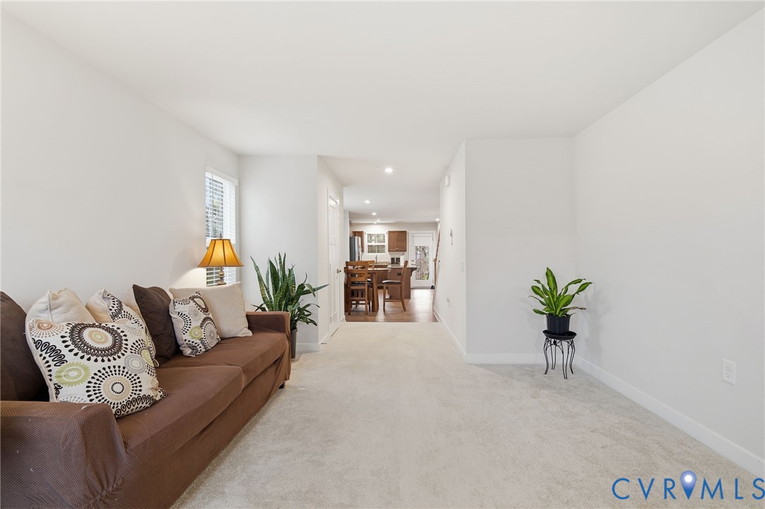 5512 Addison Gate Drive Richmond, VA 23234 - Photo 5 of 22 Carpeted living room with recessed lighting and ba
