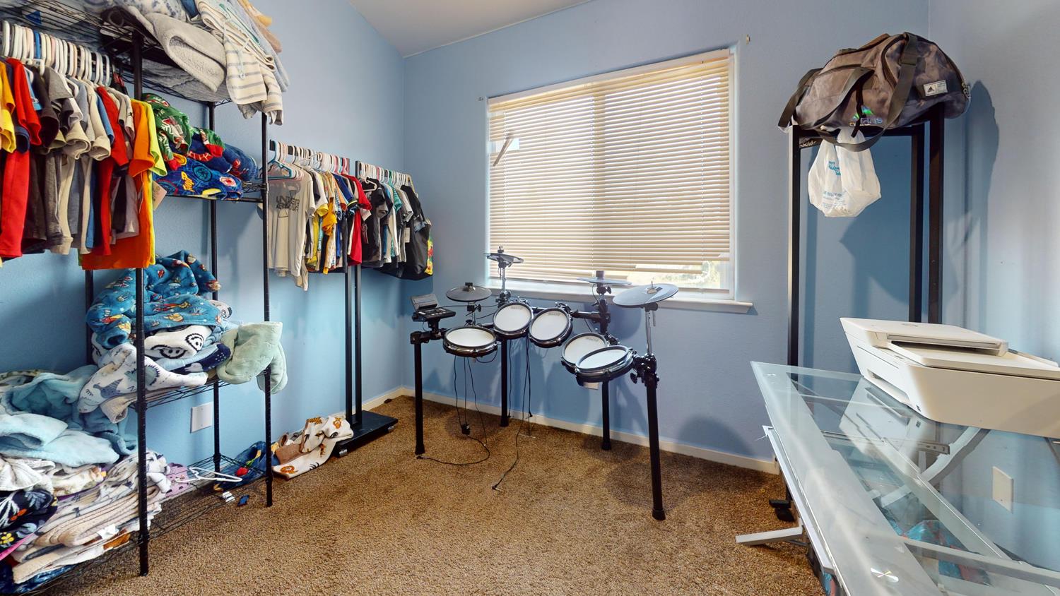 185 River Pointe Madera, CA 93637 - Photo 23 of 36 a view of a room with gym equipment