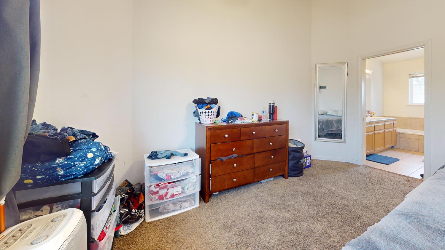 185 River Pointe Madera, CA 93637 - Photo 27 of 36 a bedroom with a baby bed baby crib and a dresser