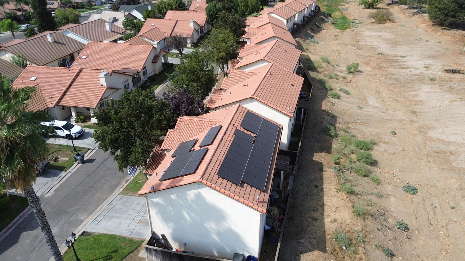 185 River Pointe Madera, CA 93637 - Photo 32 of 36 an aerial view of house with yard