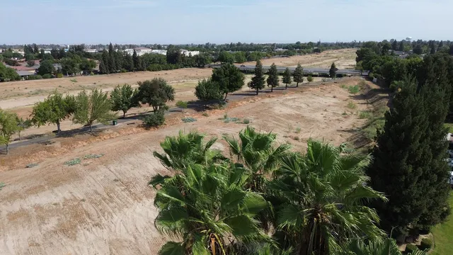 a view of a lake with houses in outdoor space