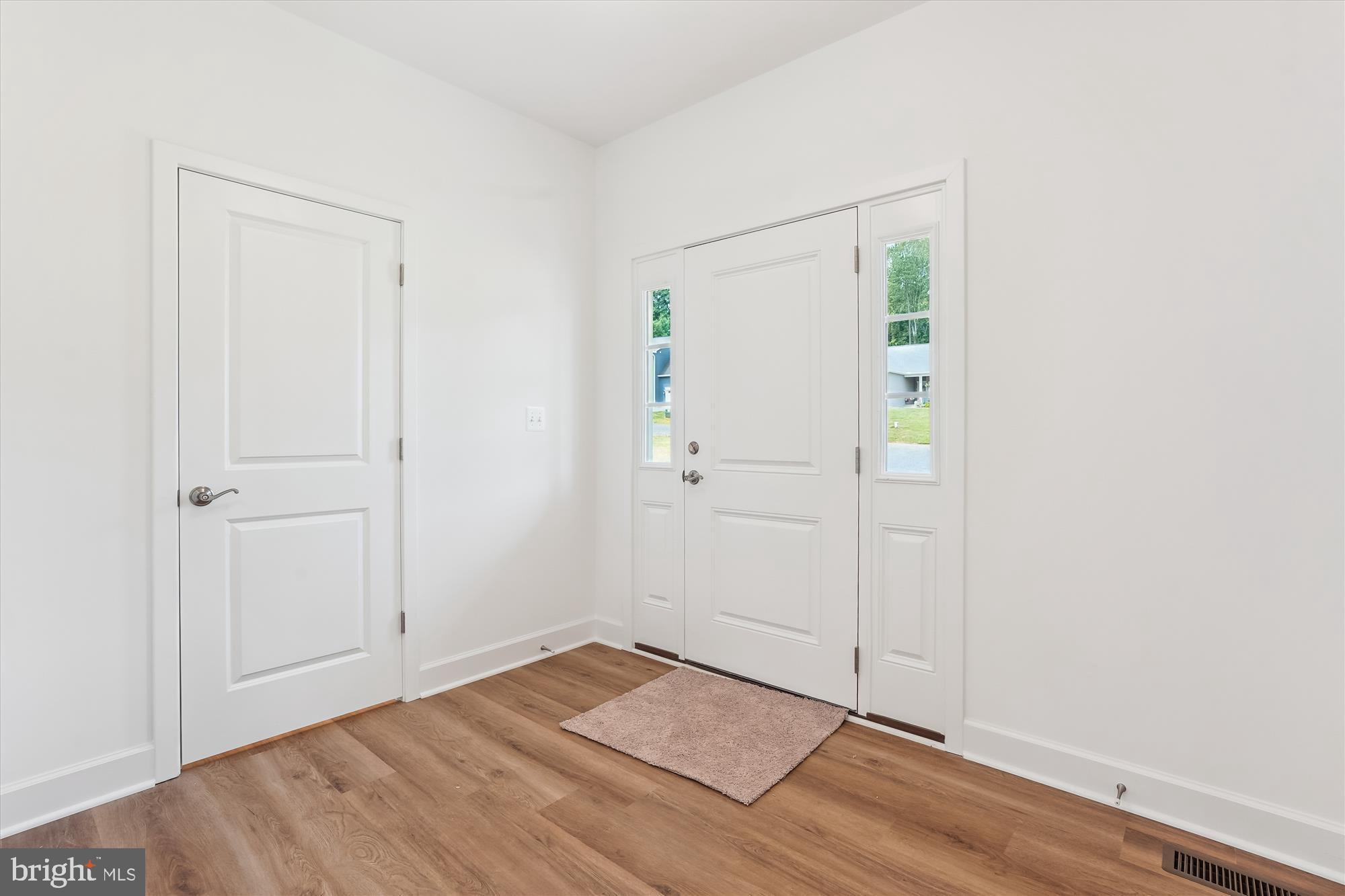 13053 Korea Road Amissville, VA 20106 - Photo 24 of 66 an empty room with wooden floor
