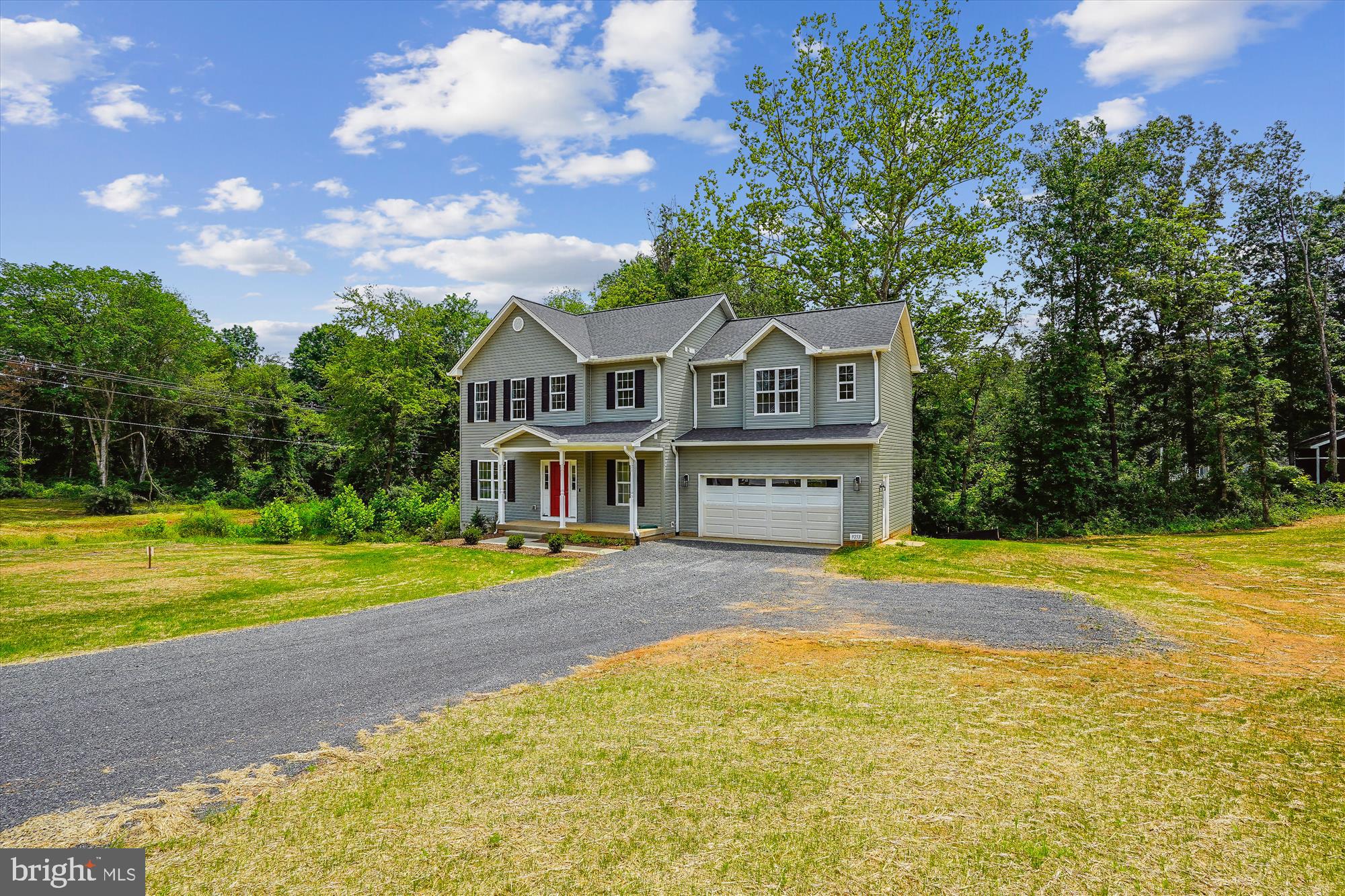 13053 Korea Road Amissville, VA 20106 - Photo 29 of 66 a front view of a house with a yard and trees
