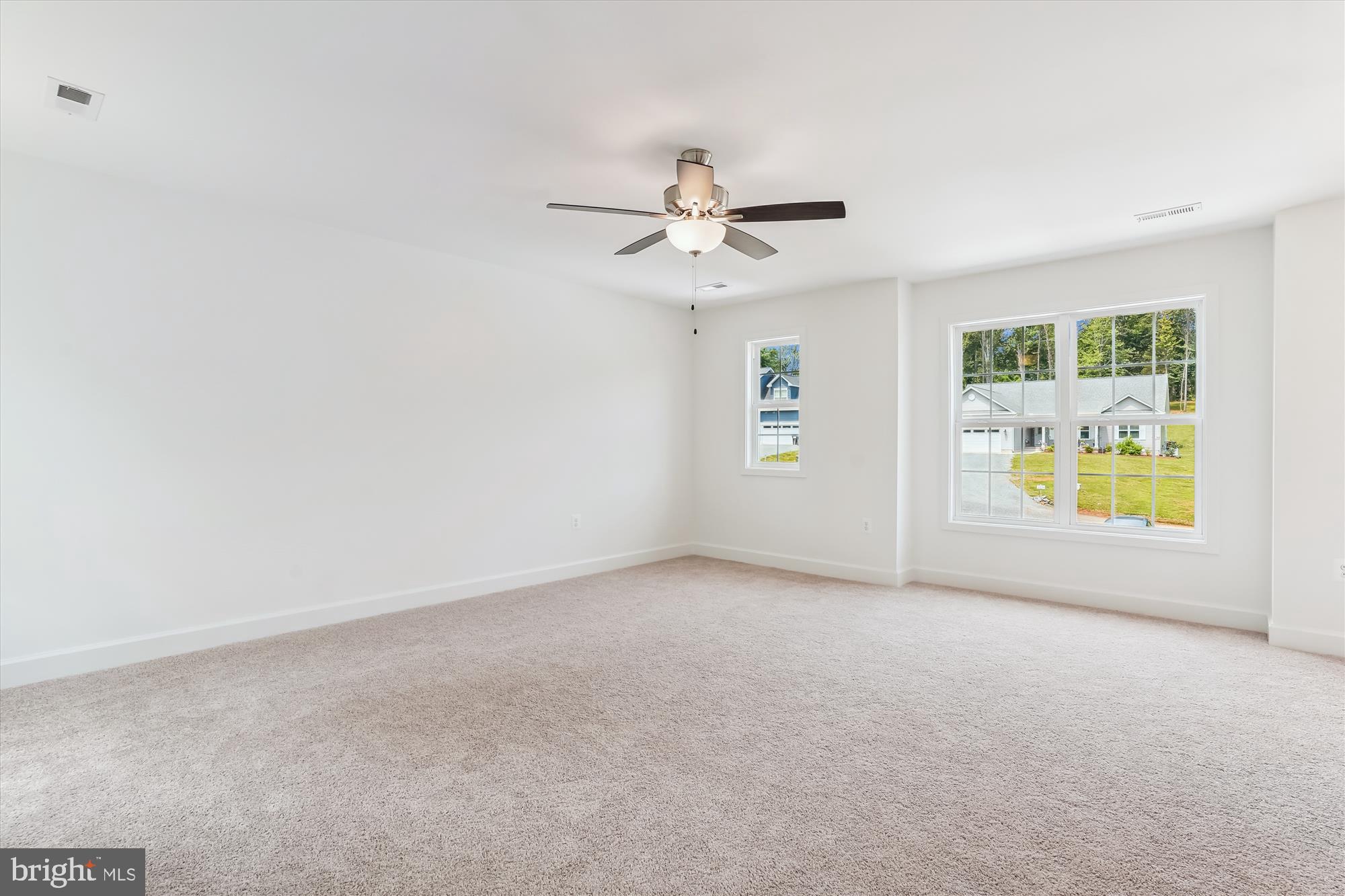 13053 Korea Road Amissville, VA 20106 - Photo 56 of 66 an empty room with windows and ceiling fan view